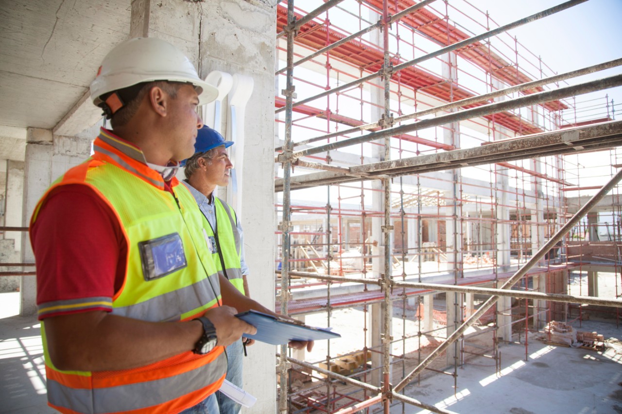 two-male-contractors-on-a-building-construction-site.jpg